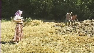 Two Farmers and One Horny Babe Bang Their Fuck Holes on the Field