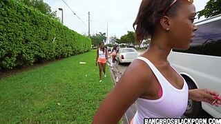 Black teens operating a car wash stop their work for some extra money