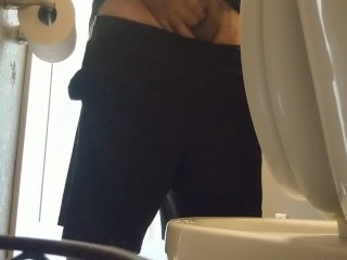 atches pee in restroom