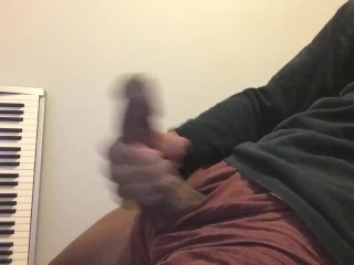 BIG LATINO COCK STROKES AND CUMS ALL OVER HIMSELF.