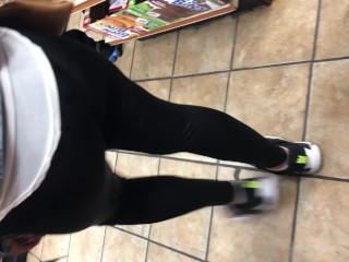 Black transparent tight bending over in store
