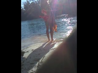 blonde sheds her top in public on river beach as butterfy shed cocoons