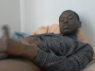 Laying in bed and masturbating