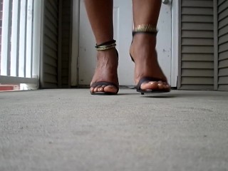 Majesty Feet In Heels Out On Balcony