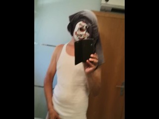 Masked young guy jerks and shoots a load
