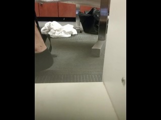 Penis peek a boo in locker room.