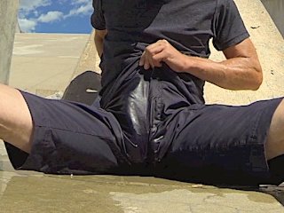 Pissing black athletic shorts in public and cumming inside them