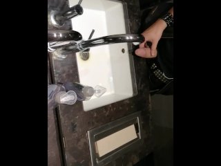 Pissing in the sink at work