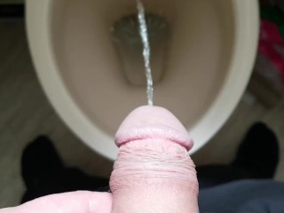 Pulling back my foreskin and pissing
