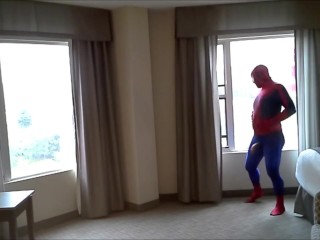 spiderman jerking off at hotel window
