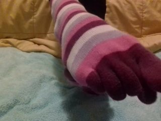 Spreading my toes and showing you my feet and soles in toe socks