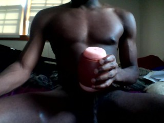 Stroking my black cock with my toy