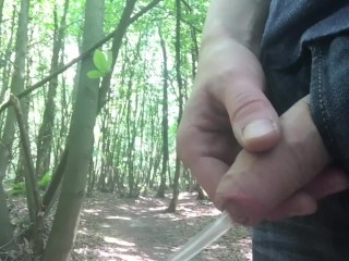 taking a piss in the woods