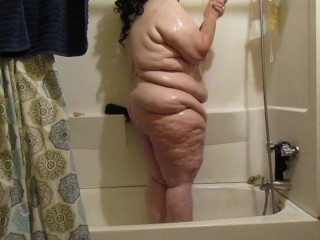 Taking a shower.
