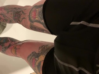 Tattooed guy desperate wetting taking off shorts and boxers