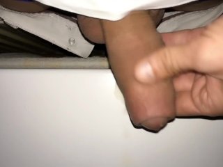 Teen piss out of a window in a entrance of apartment building - Rainy night