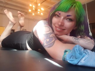 The Pose. Goth emo girl  showing off dirty soles in a bdsm dungeon