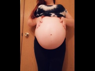 Tiny mama gives a sneak peak of her unborn while baby daddy showers
