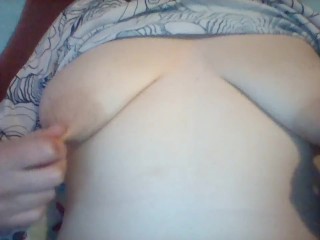 Tugging and twisting my aching nipples